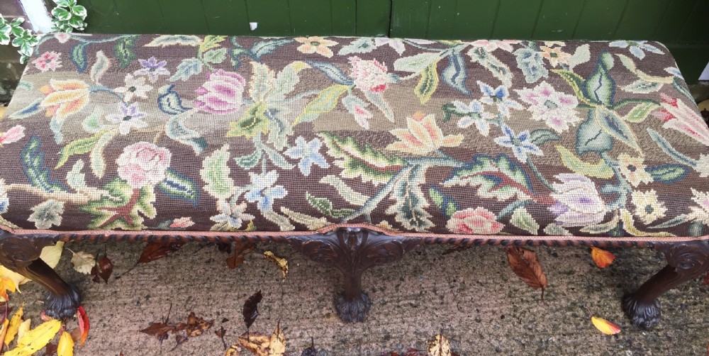 Late C19th George II period style carved mahogany stool or window-seat with needlework tapestry covered top. View IV