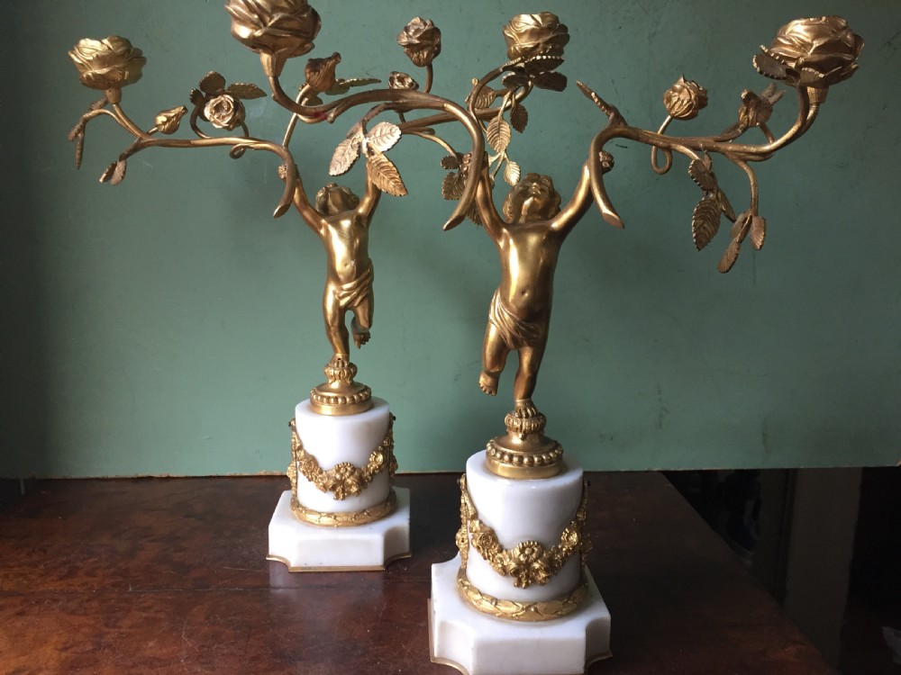 Smart quality pair of French late C19th ormolu bronze and white marble cherub candelabras. View III