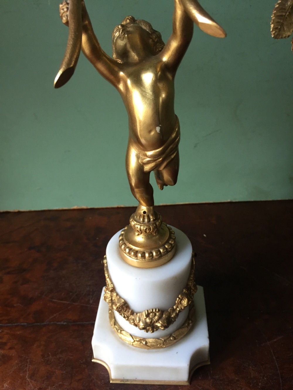 Smart quality pair of French late C19th ormolu bronze and white marble cherub candelabras. View V