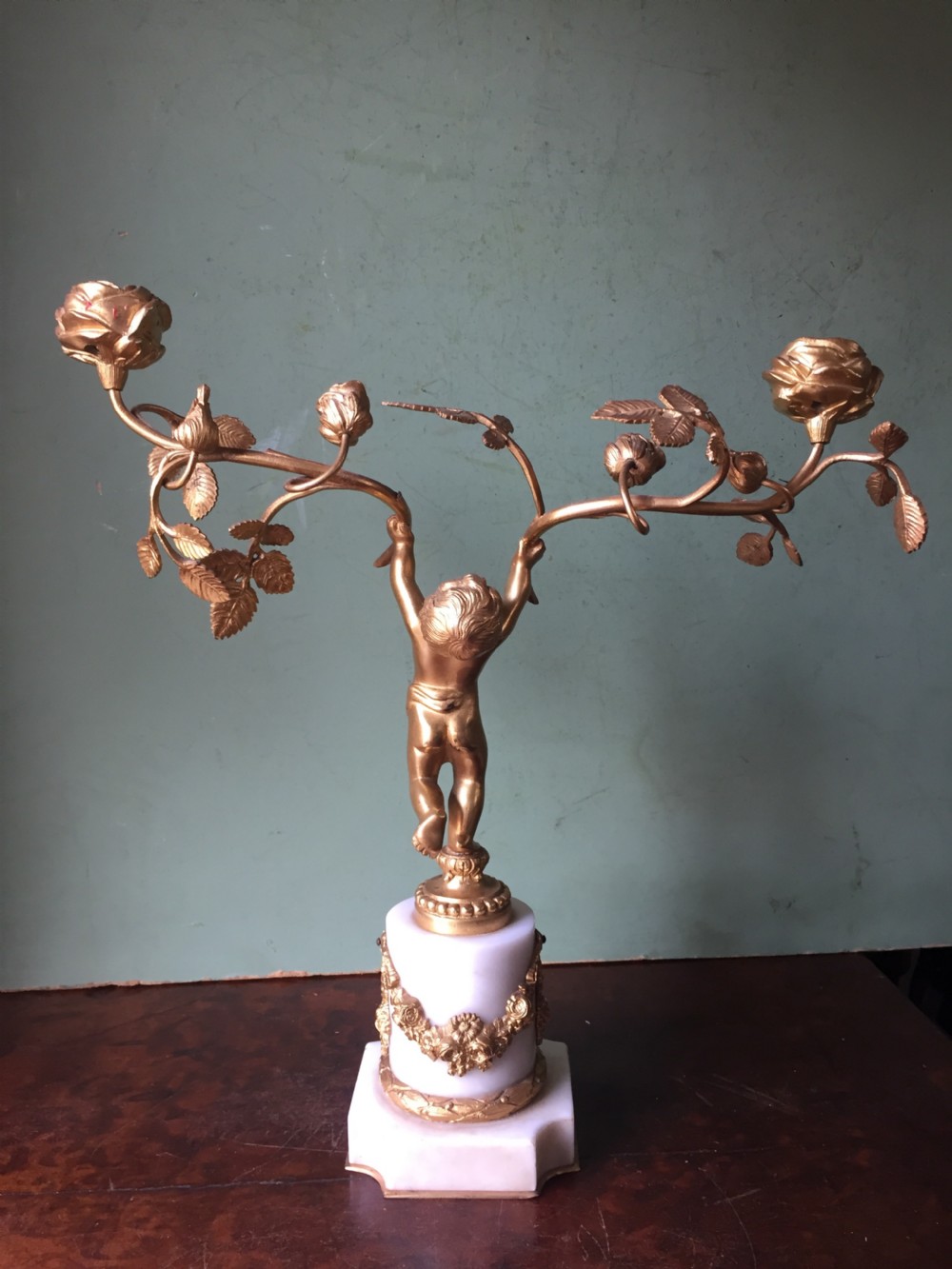 Smart quality pair of French late C19th ormolu bronze and white marble cherub candelabras. View VIII