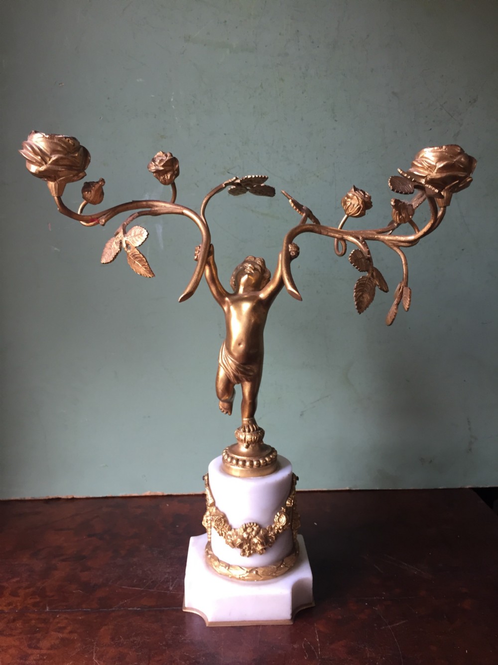Smart quality pair of French late C19th ormolu bronze and white marble cherub candelabras. View IX