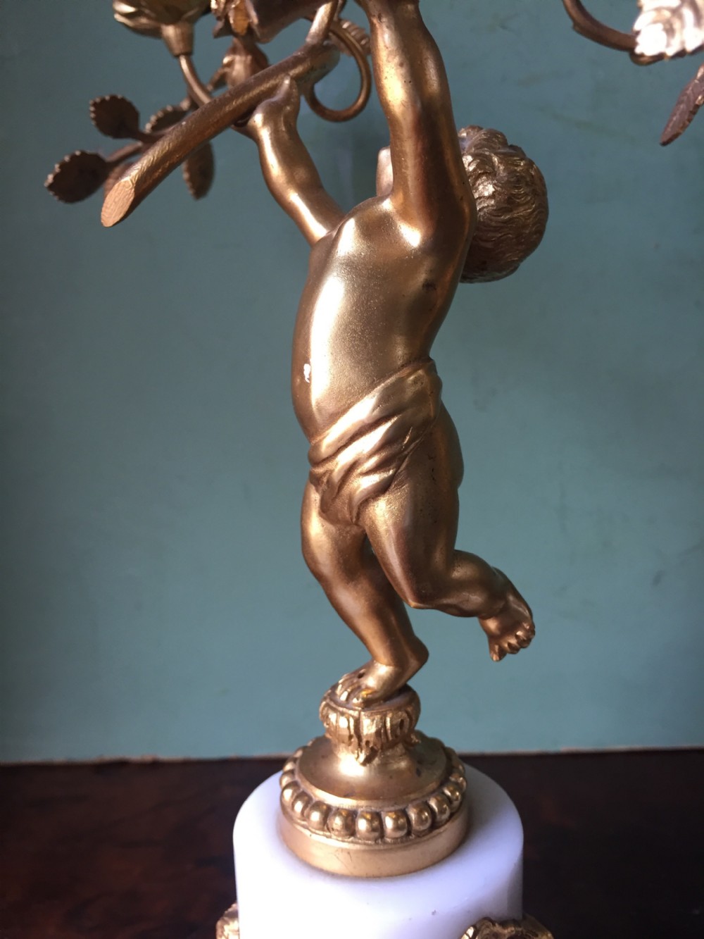 Smart quality pair of French late C19th ormolu bronze and white marble cherub candelabras. View XIV
