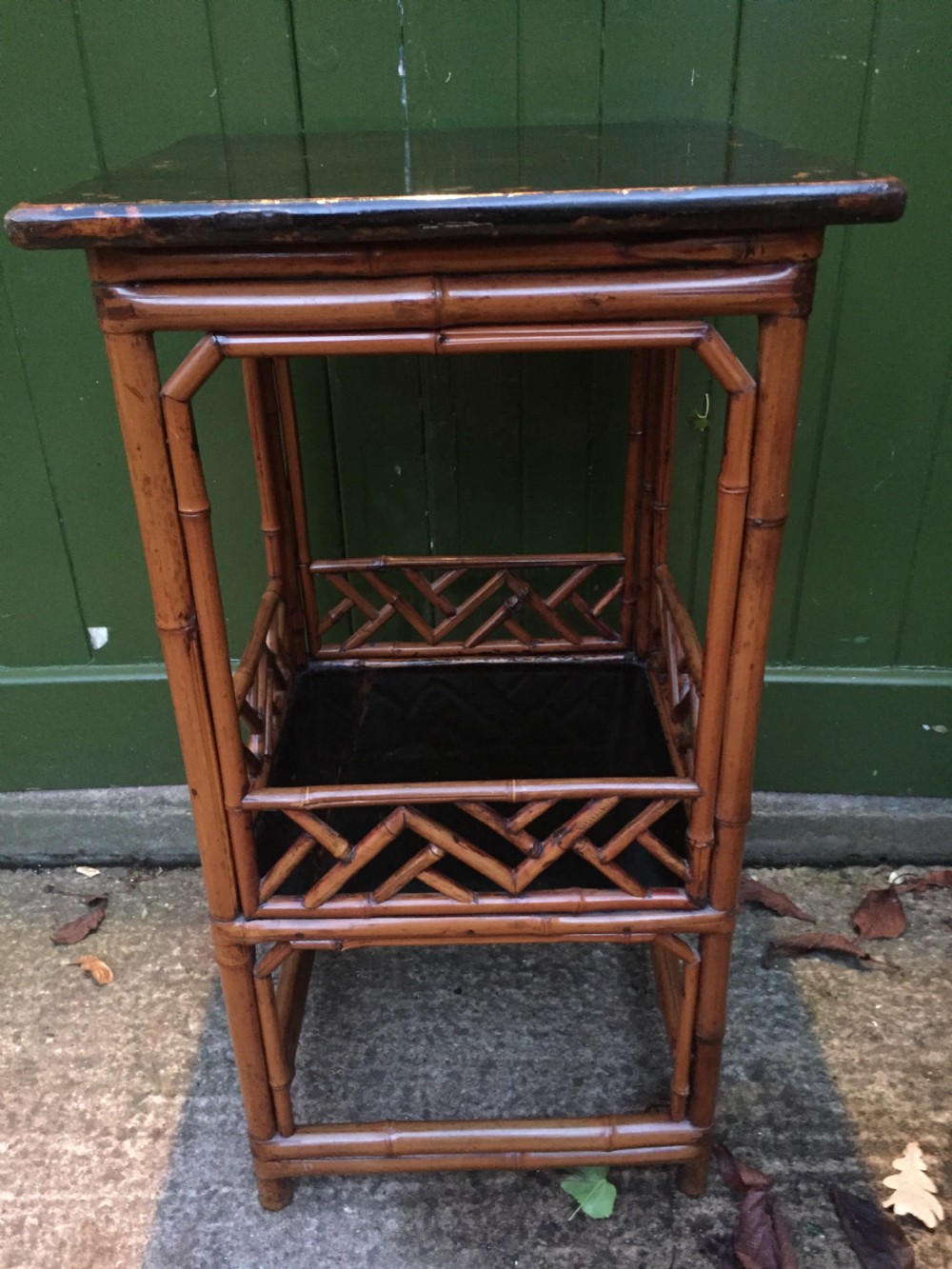 Decorative pair of early C20th Chinese polished bamboo and lacquer armchairs and table in the C18th manner  . View V