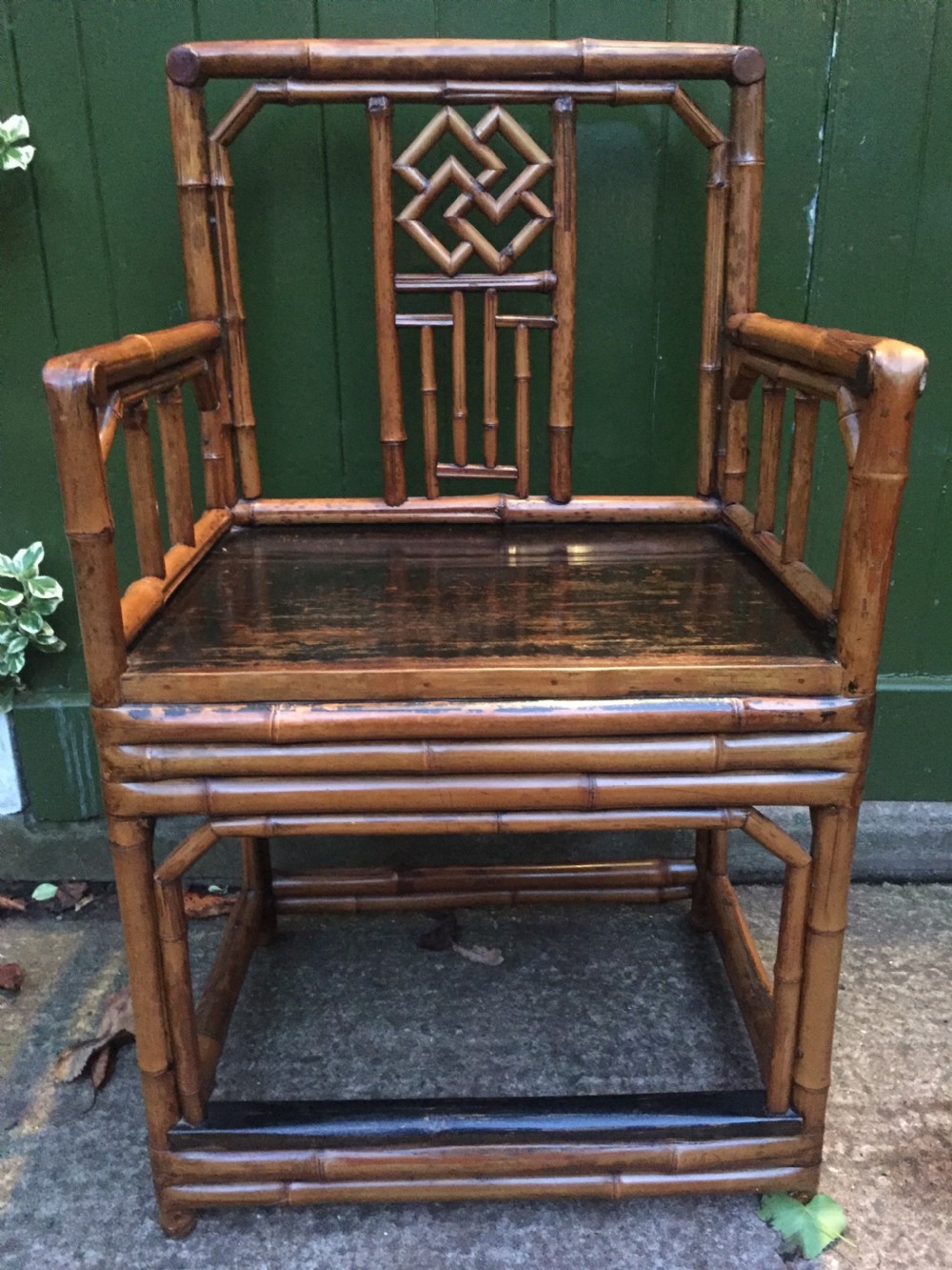Decorative pair of early C20th Chinese polished bamboo and lacquer armchairs and table in the C18th manner  . View IX