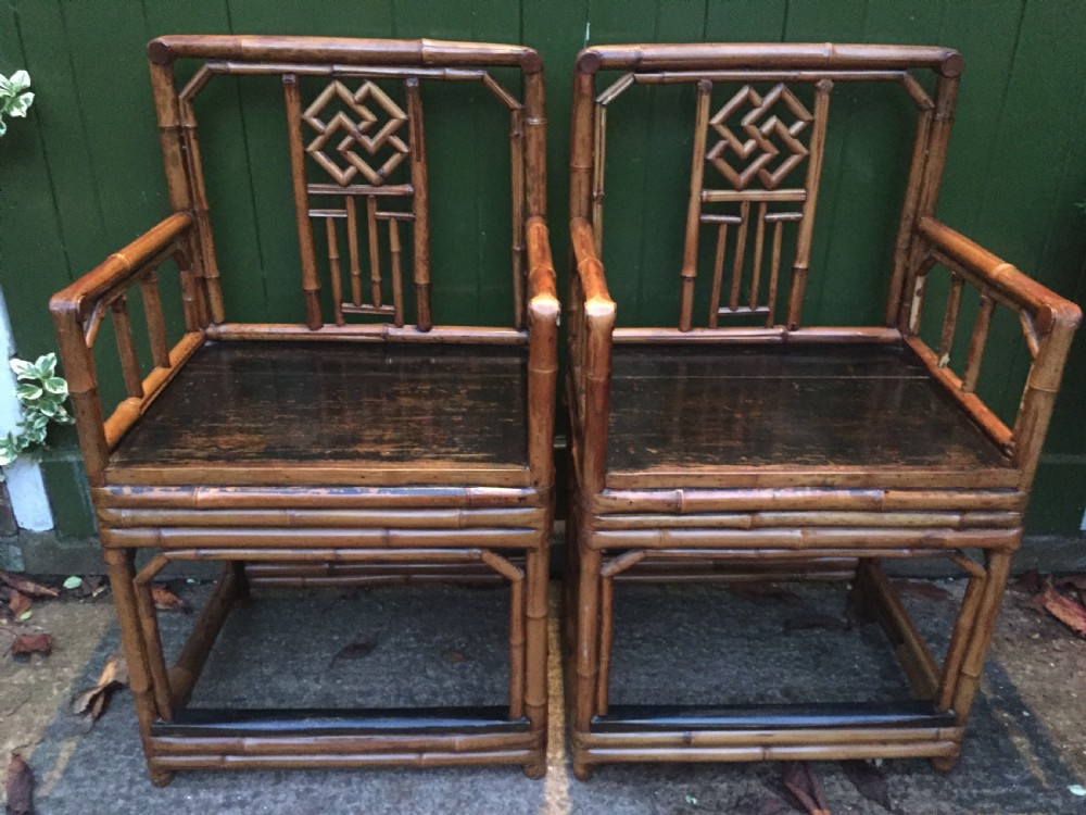 Decorative pair of early C20th Chinese polished bamboo and lacquer armchairs and table in the C18th manner  . View XII