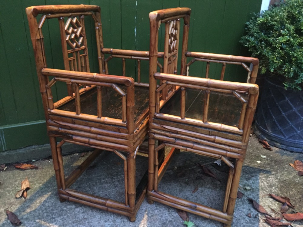 Decorative pair of early C20th Chinese polished bamboo and lacquer armchairs and table in the C18th manner  . View XVI