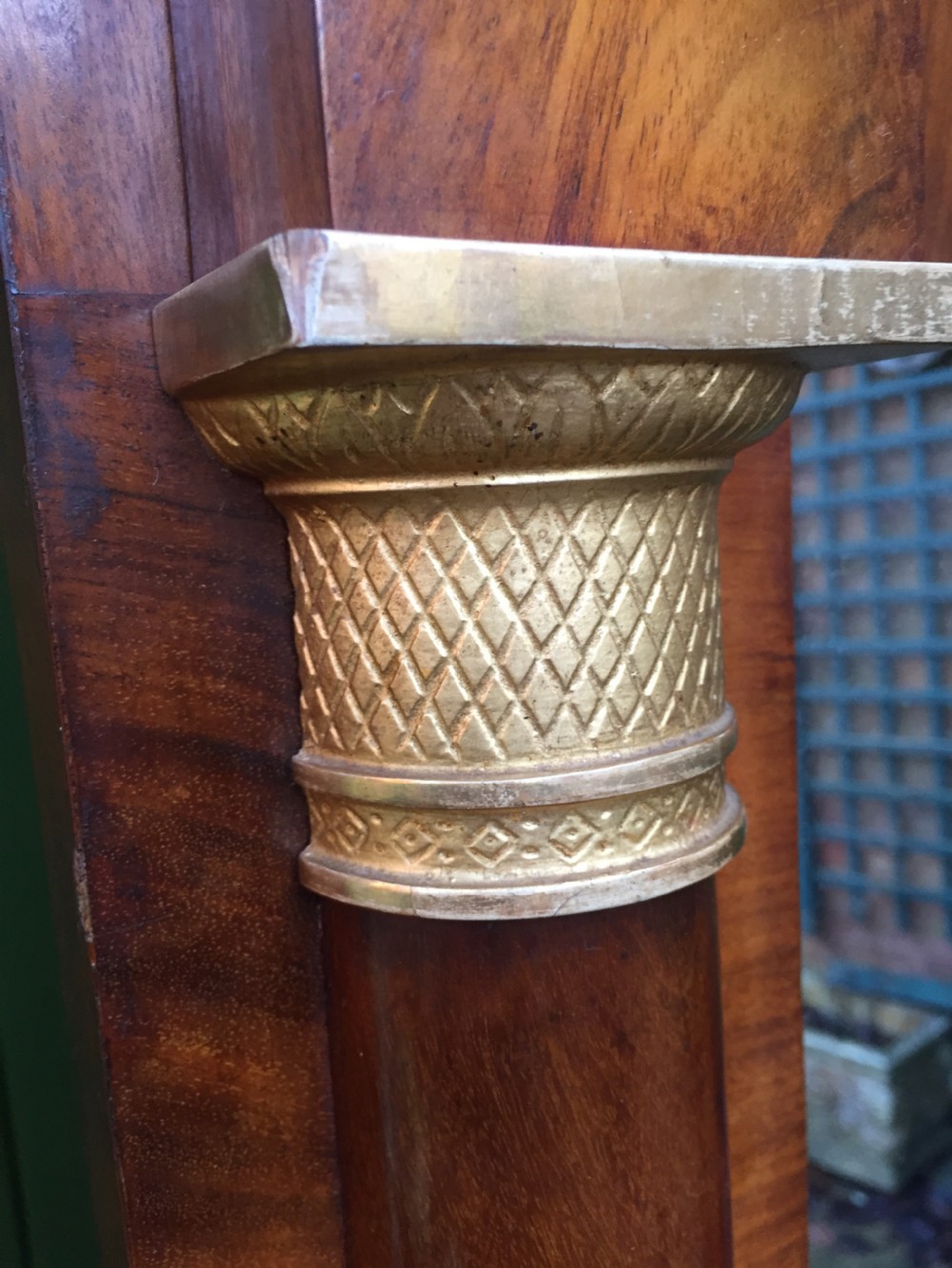 Early C19th Baltic region mahogany framed pier mirror with parcel-gilt column caps and bases . View III