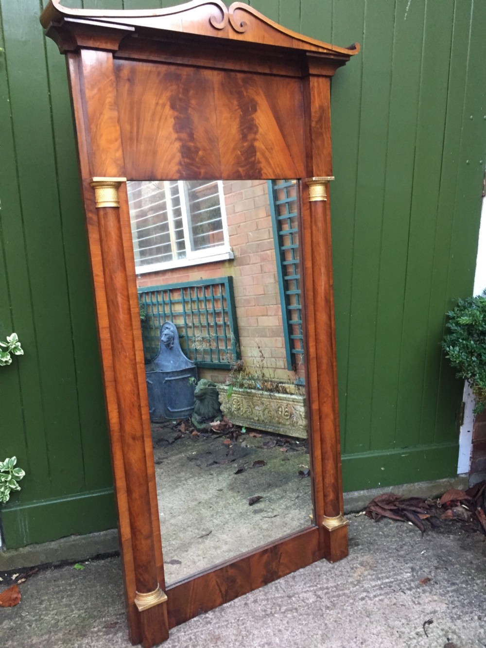 Early C19th Baltic region mahogany framed pier mirror with parcel-gilt column caps and bases . View IX