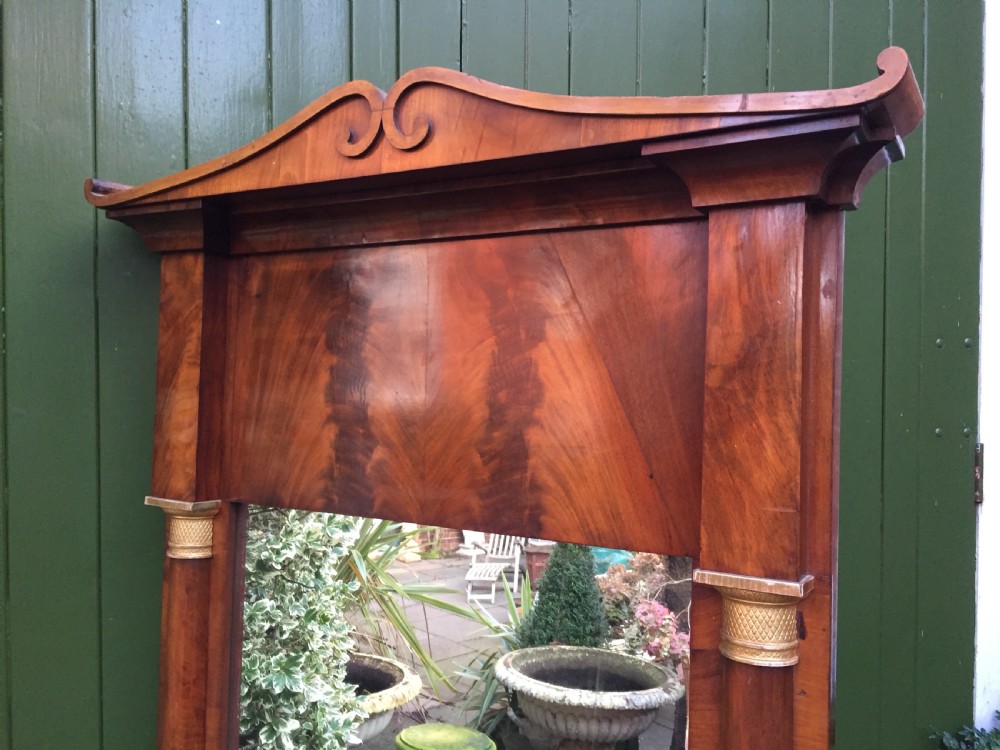Early C19th Baltic region mahogany framed pier mirror with parcel-gilt column caps and bases . View XI