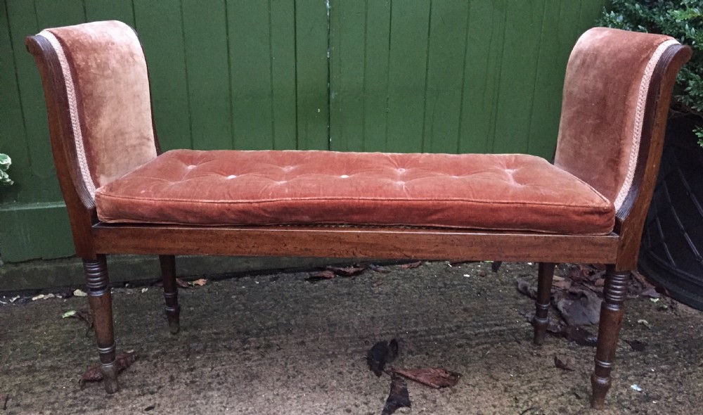 An elegant early C19th Regency mahogany-framed window-seat of unusual form. View II