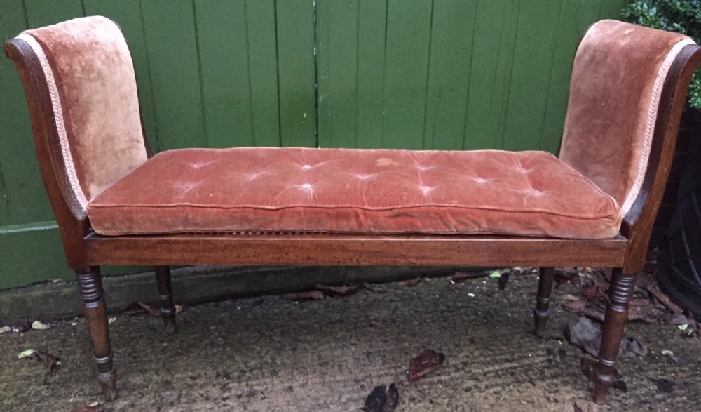An elegant early C19th Regency mahogany-framed window-seat of unusual form. View XII