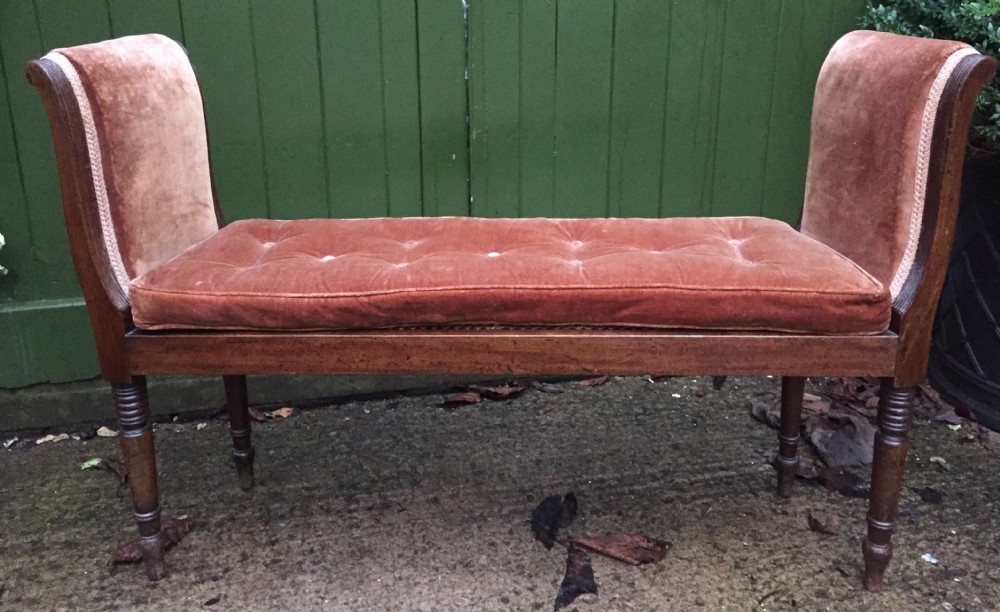 An elegant early C19th Regency mahogany-framed window-seat of unusual form. View XIX