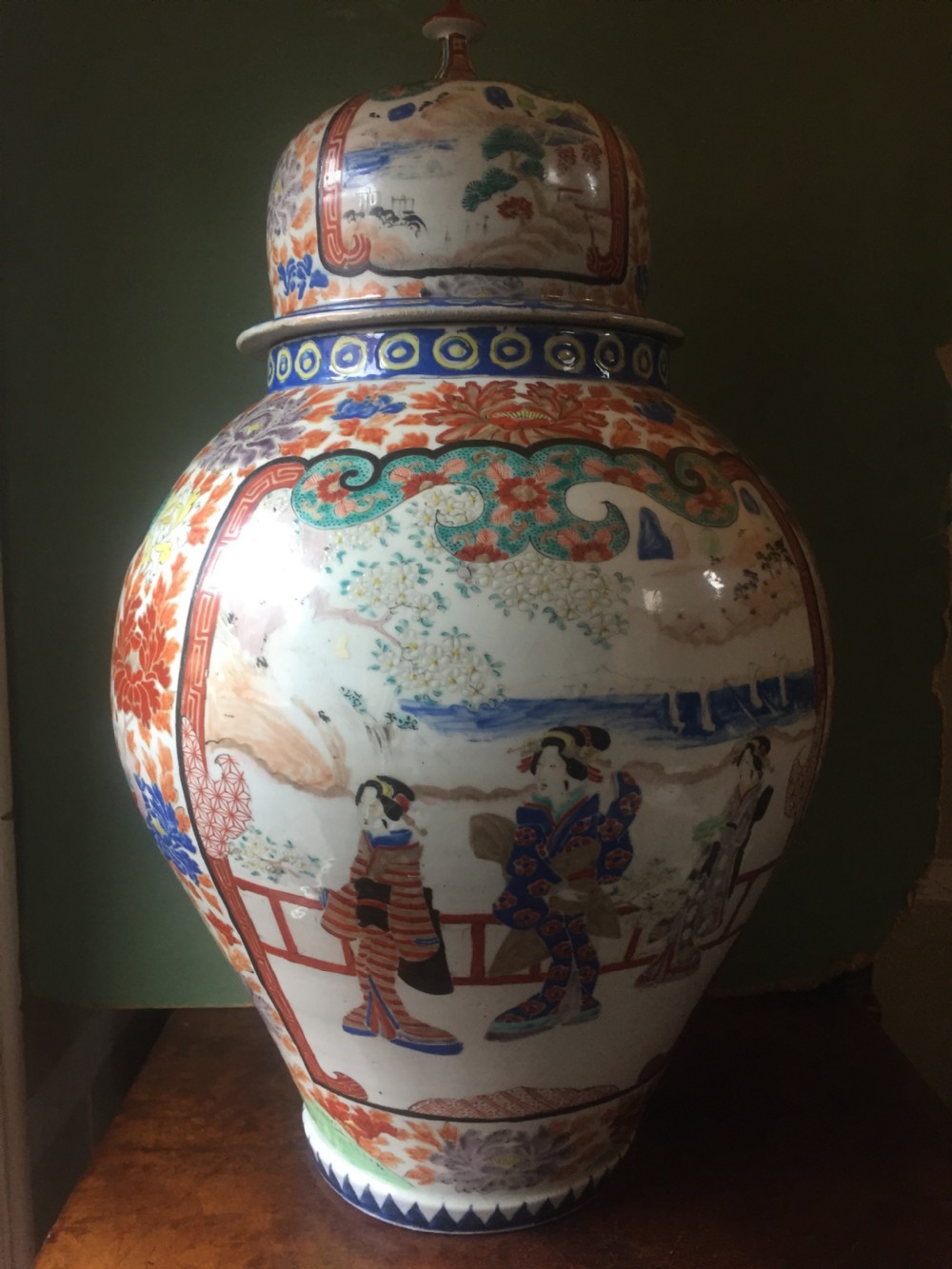 Large late C19th Japanese Arita porcelain vase and cover decorated in the Imari palette.