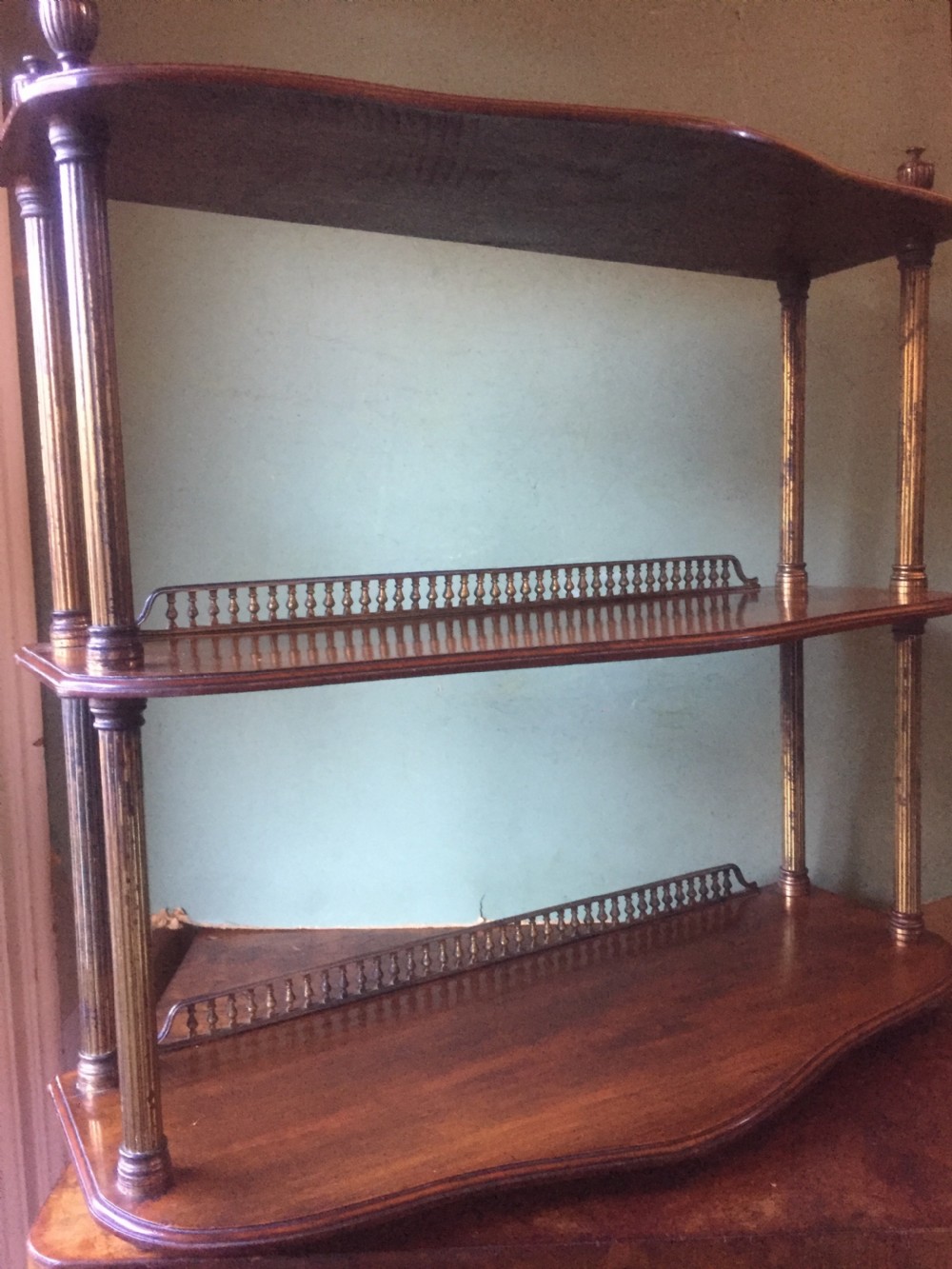 Set of late C19th walnut and brass-mounted shelves in the manner of James Shoolbred & Co., London. View VIII