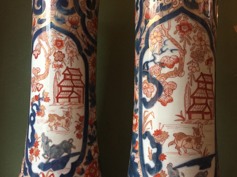 Fine pair of mid C19th Japanese Imari pattern porcelain lidded vases of unusual shape and form . View XIX