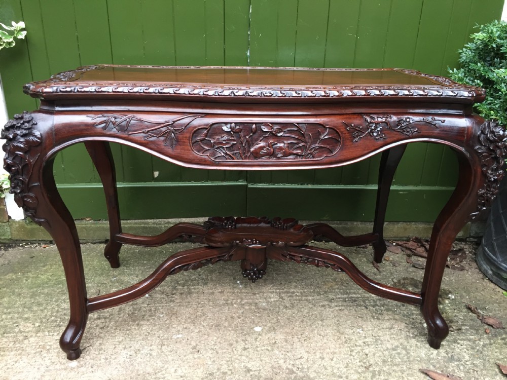 Late C19th Chinese Qing Dynasty carved hardwood centre table of exhibition quality. View XXIV