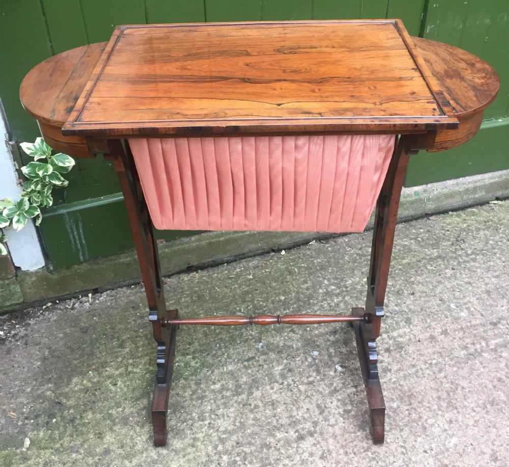 Elegant early C19th George IV period rosewood sewing or work table of Gillows design.