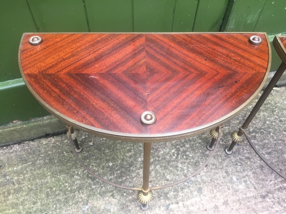 Pair of early C20th brass-framed semi-circular drinks or end tables with quarter-veneered mahogany tops. View III