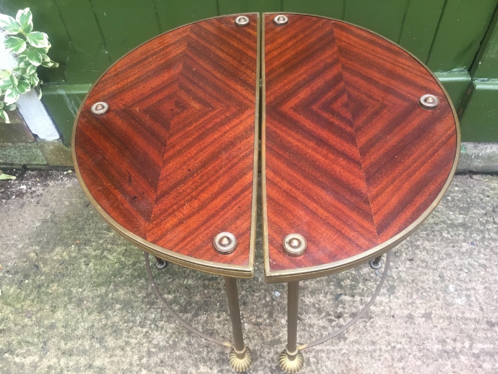 Pair of early C20th brass-framed semi-circular drinks or end tables with quarter-veneered mahogany tops. View VII