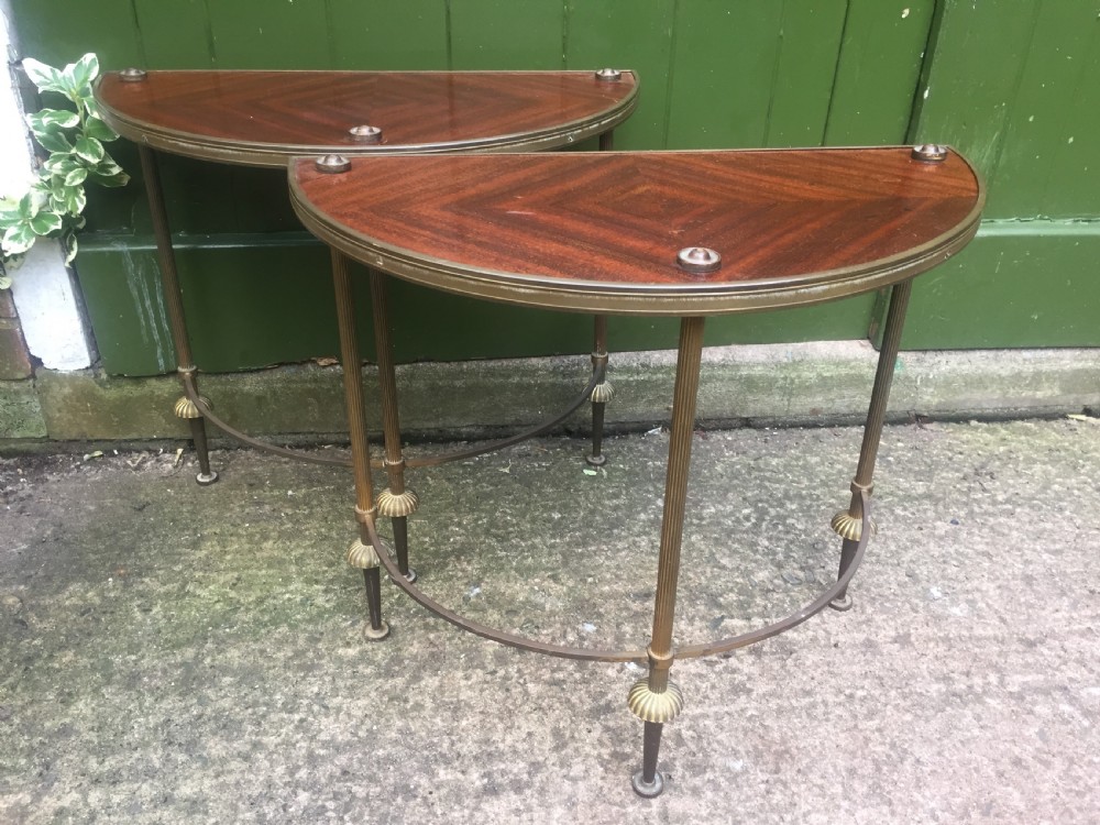 Pair of early C20th brass-framed semi-circular drinks or end tables with quarter-veneered mahogany tops. View IX