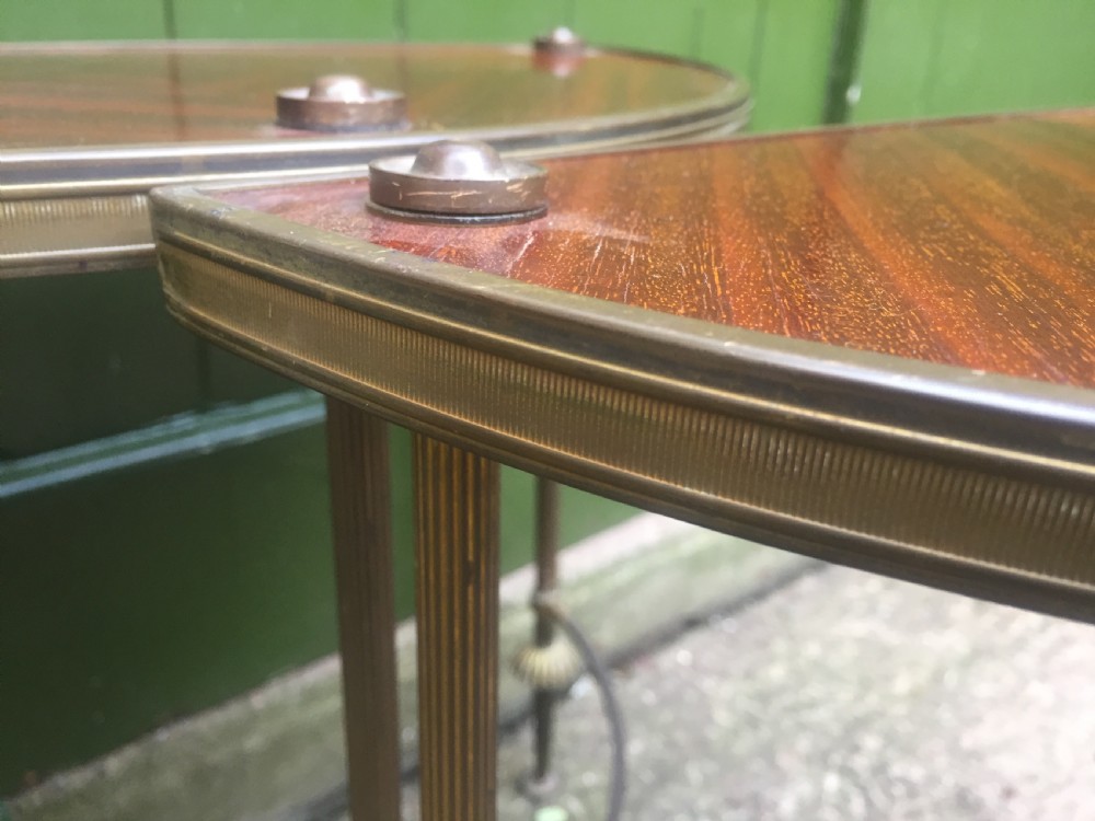 Pair of early C20th brass-framed semi-circular drinks or end tables with quarter-veneered mahogany tops. View XI