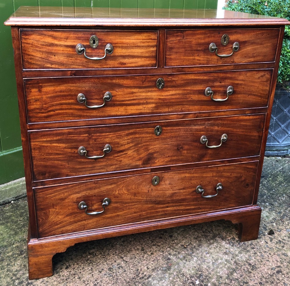 Late C18th George III period mahogany chest-of-drawers of good colour and proportions. View II