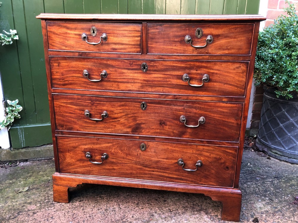 Late C18th George III period mahogany chest-of-drawers of good colour and proportions. View IV