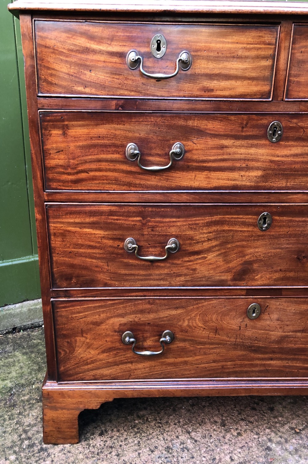 Late C18th George III period mahogany chest-of-drawers of good colour and proportions. View V