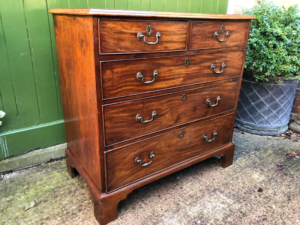 Late C18th George III period mahogany chest-of-drawers of good colour and proportions. View VIII