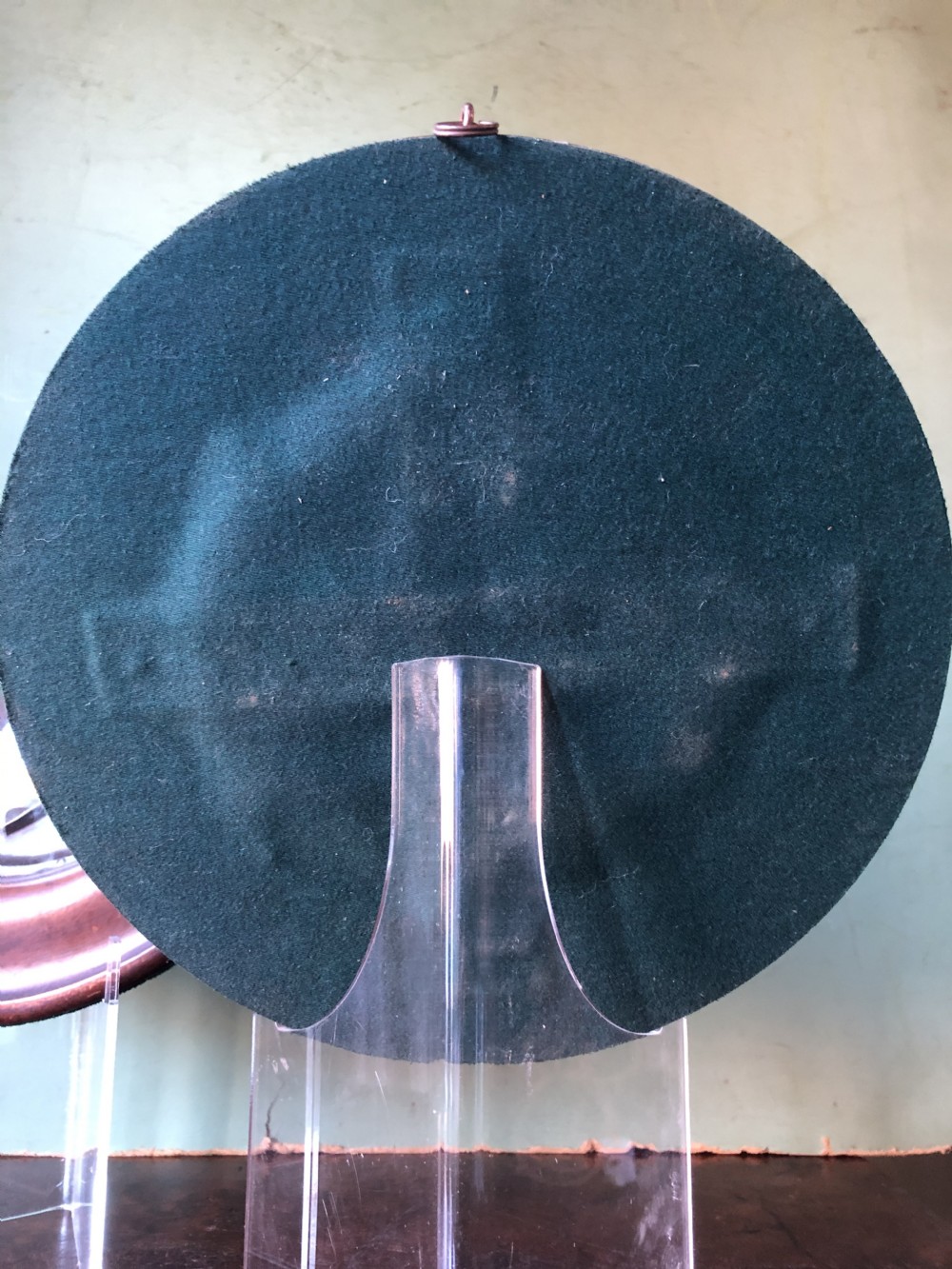 A pair of circular turned mahogany frames enclosing dark bronzed relief profile portraits of Napoleon and Marie-Louise under glass. View XIX