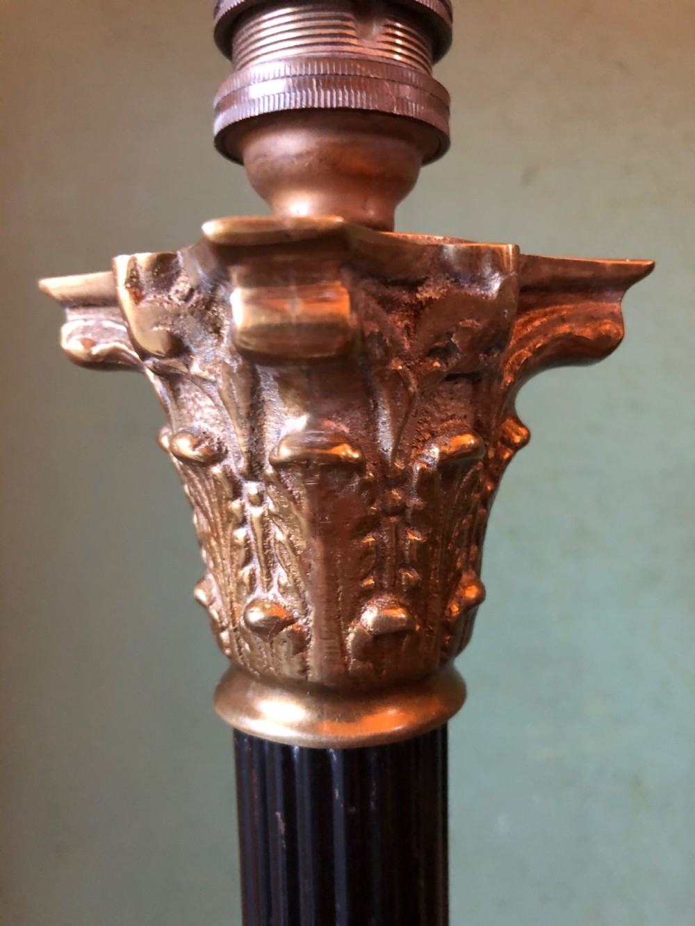 Pair of early C20th patinated and polished brass table lamps of classical column form. View VII