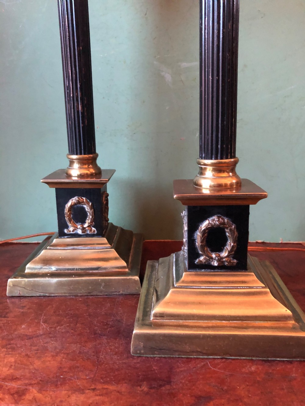 Pair of early C20th patinated and polished brass table lamps of classical column form. View XI