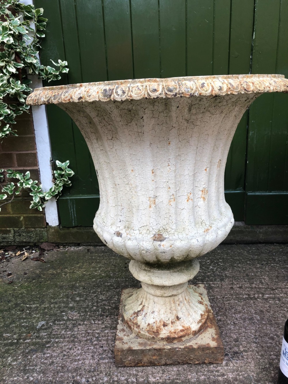 Large scale pair of early C19th Regency period cast-iron terrace or garden vases of campana form . View IV