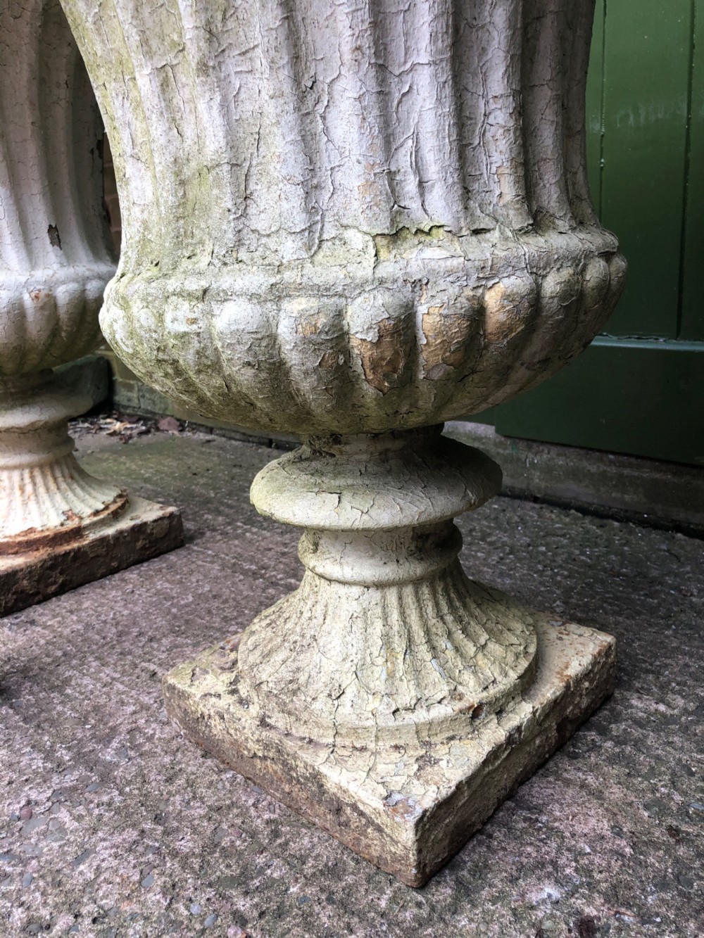Large scale pair of early C19th Regency period cast-iron terrace or garden vases of campana form . View VI