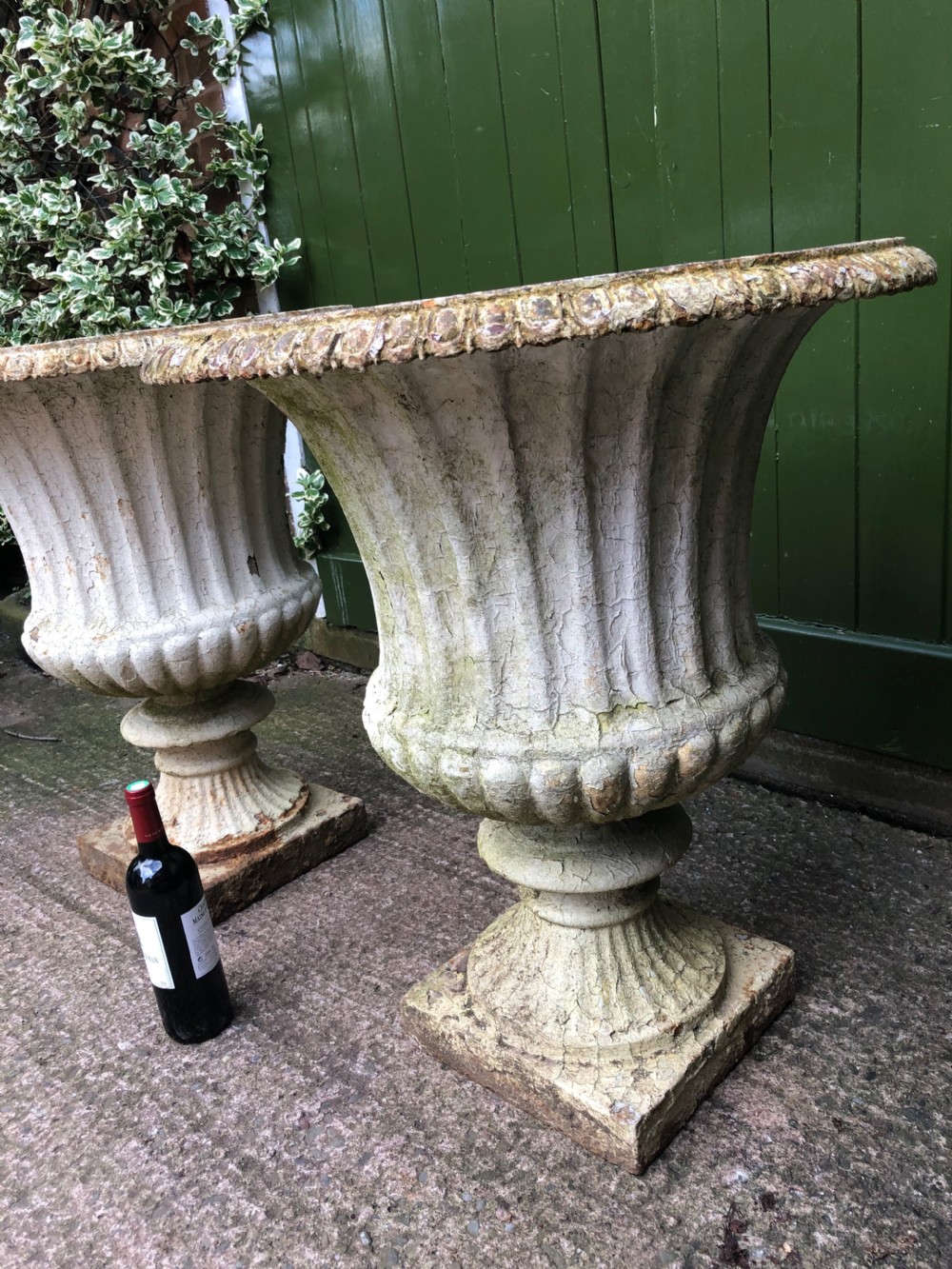 Large scale pair of early C19th Regency period cast-iron terrace or garden vases of campana form . View VII