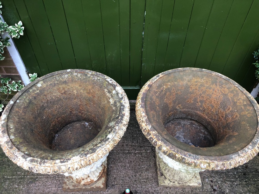 Large scale pair of early C19th Regency period cast-iron terrace or garden vases of campana form . View VIII