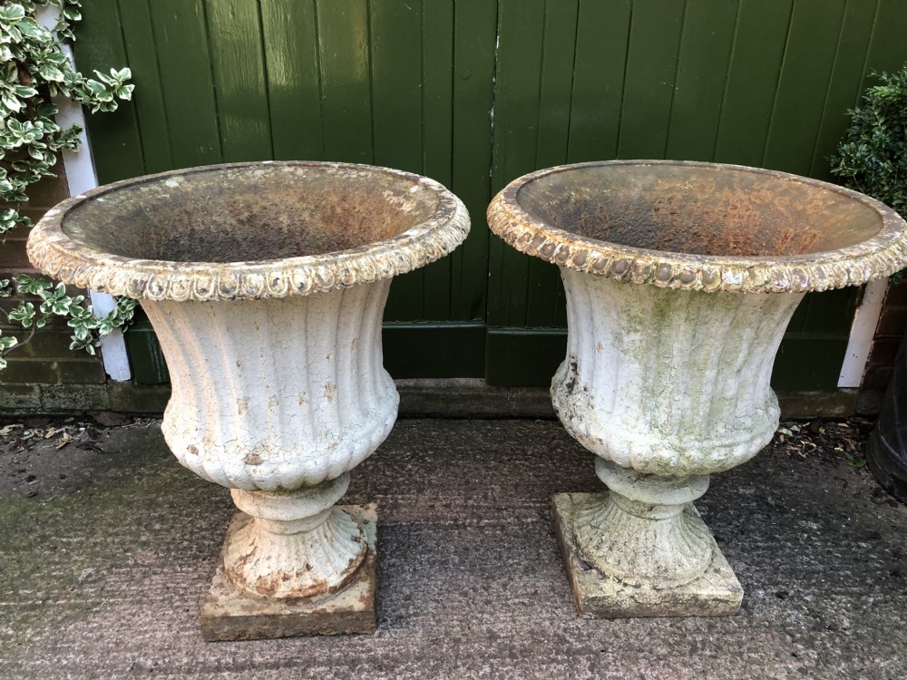 Large scale pair of early C19th Regency period cast-iron terrace or garden vases of campana form . View XII