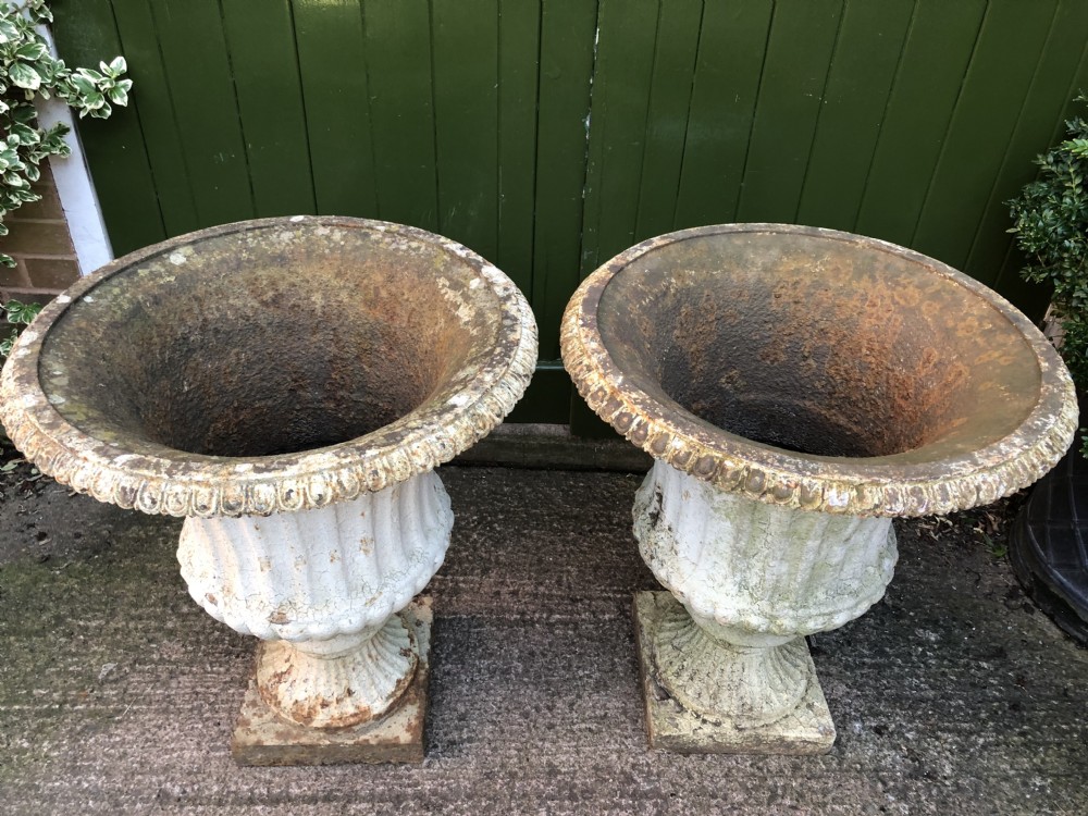 Large scale pair of early C19th Regency period cast-iron terrace or garden vases of campana form . View XIII