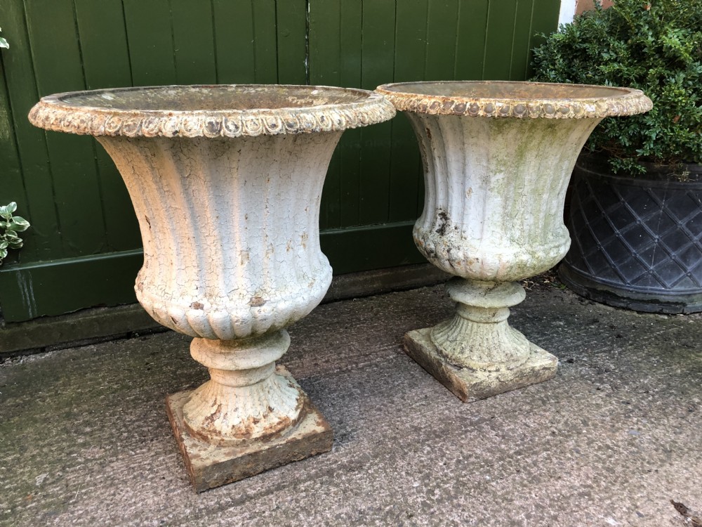 Large scale pair of early C19th Regency period cast-iron terrace or garden vases of campana form . View XIV