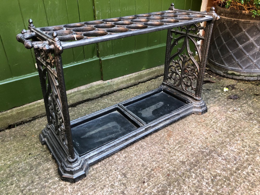 Mid C19th cast-iron country house stick or umbrella stand of gothic design.
