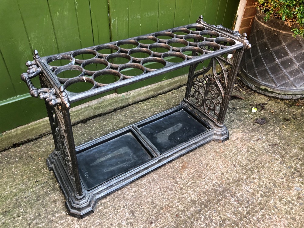 Mid C19th cast-iron country house stick or umbrella stand of gothic design. View IX