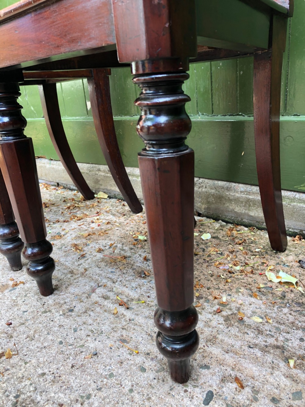 Pair of early C19th George IV period mahogany hall chairs of Grecian revival design. View V