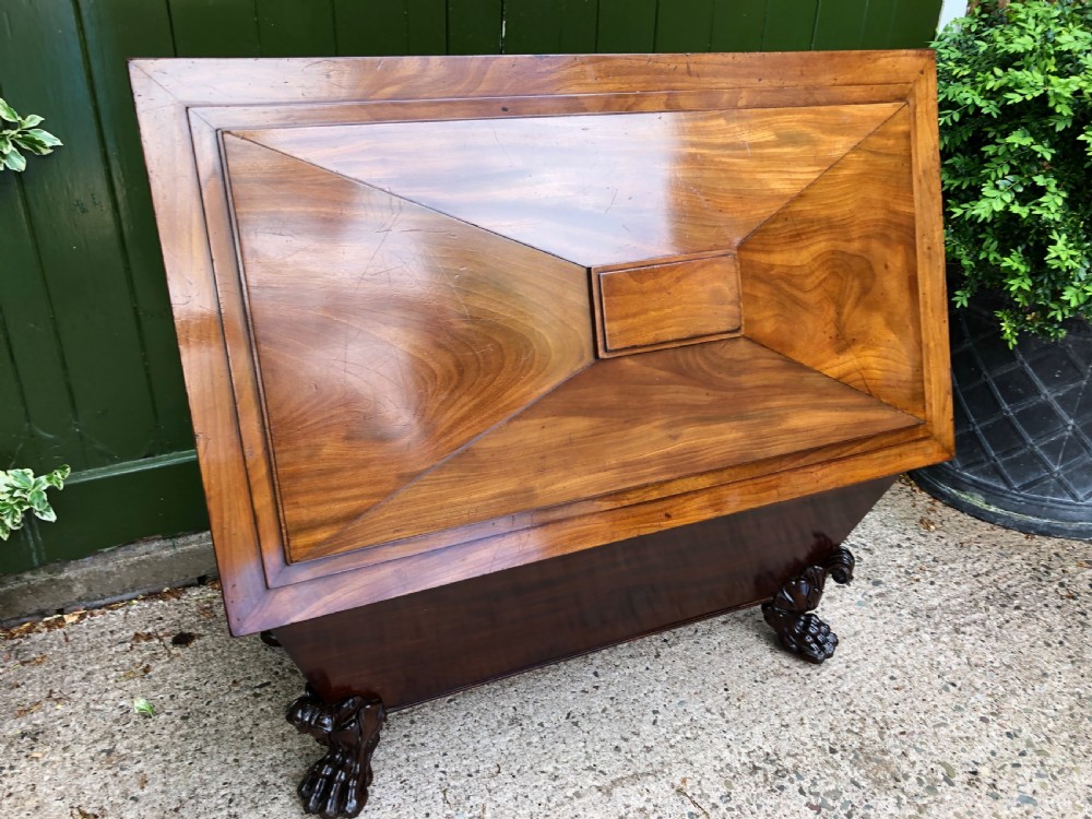 Early C19th Regency period mahogany sarcophagus wine cooler by Wilkinson, London. View XXIII