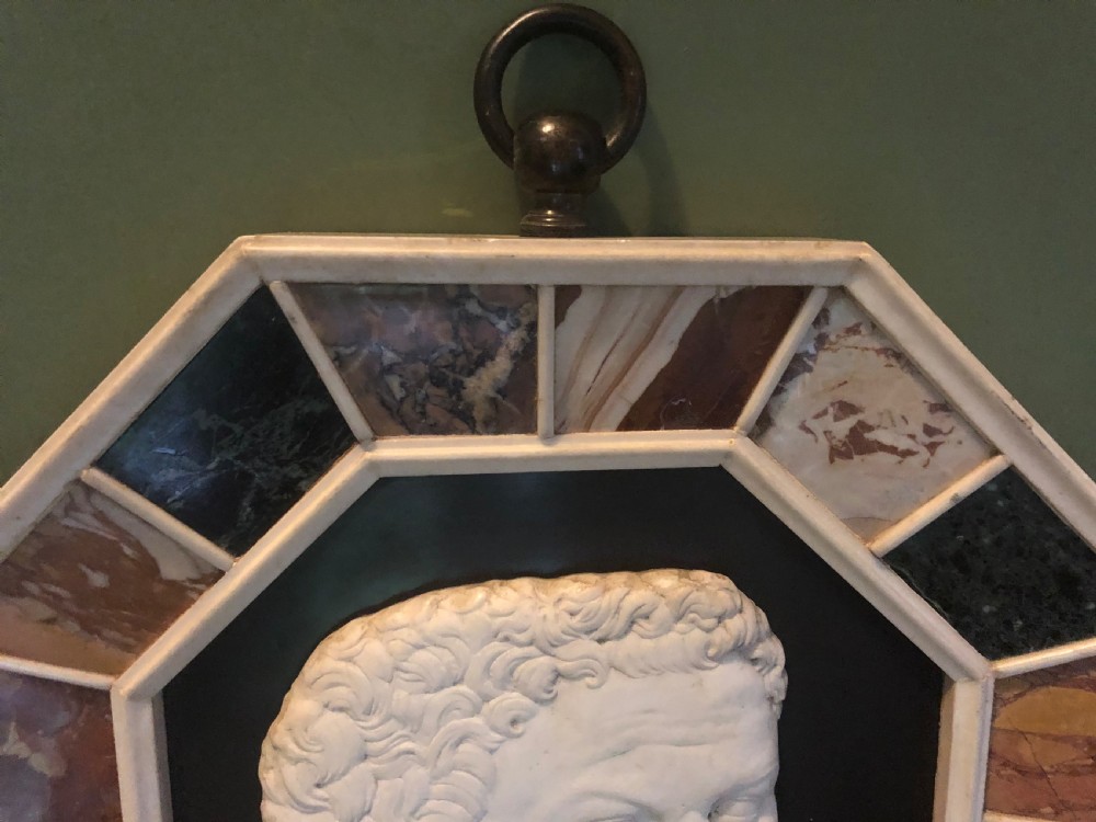 Large early C20th Italian ‘Grand Tour’ style carved marble profile in octagonal specimen marble surround frame . View VIII