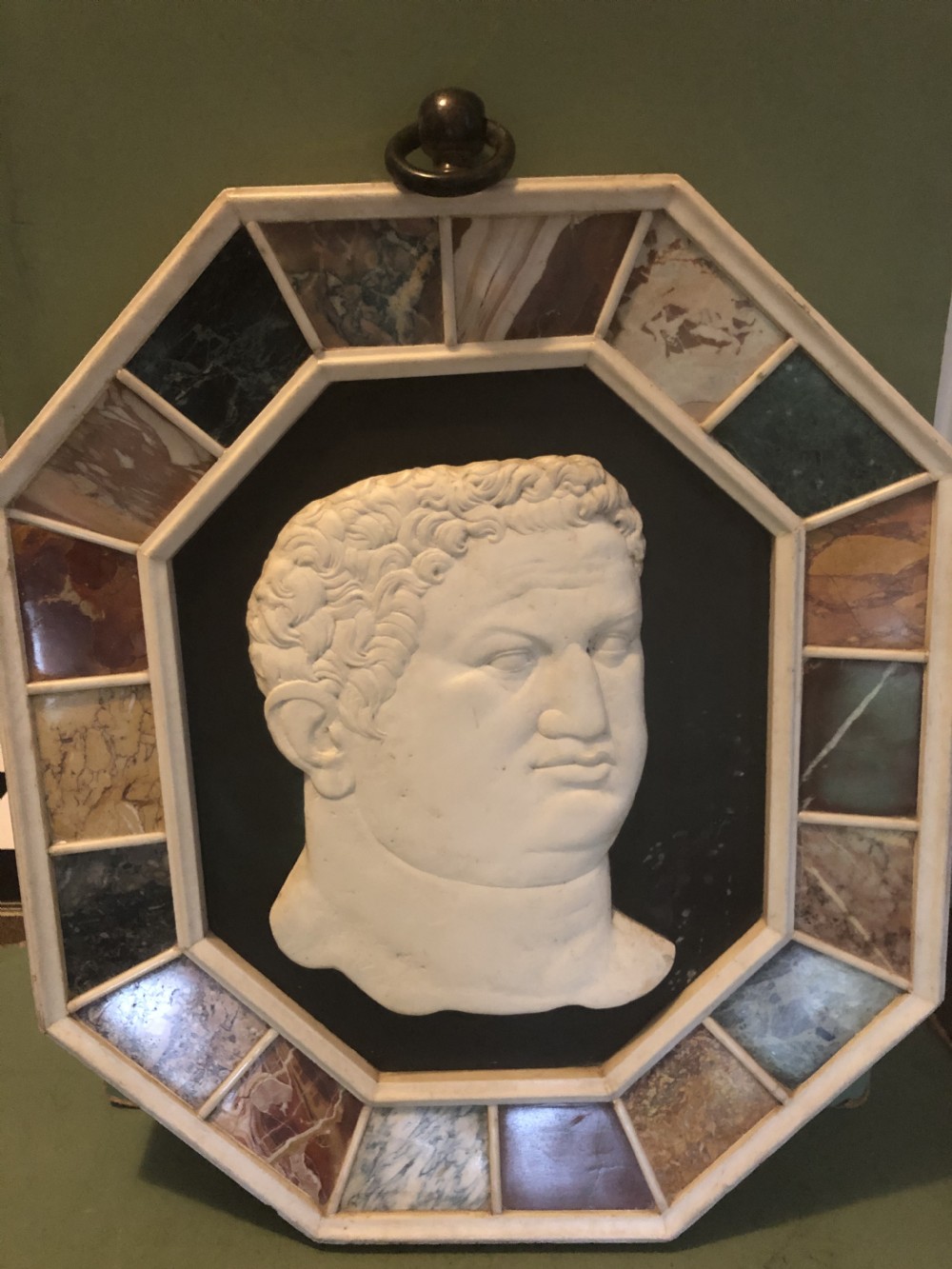 Large early C20th Italian ‘Grand Tour’ style carved marble profile in octagonal specimen marble surround frame . View XII