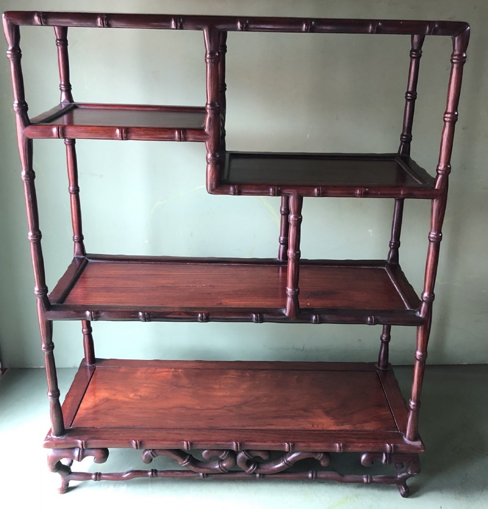 Set of early C20th Chinese hardwood table-top carved hardwood display shelves. View II