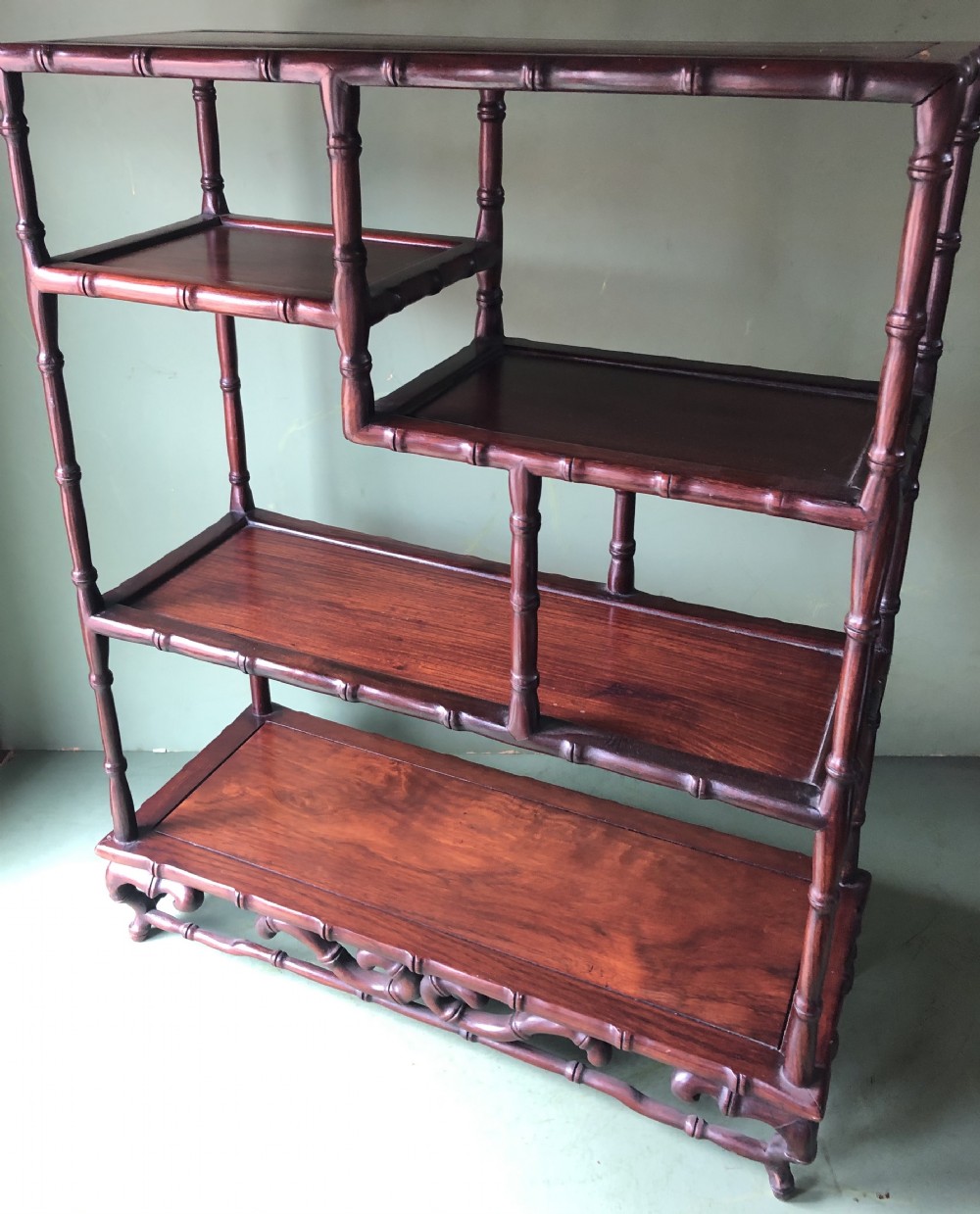 Set of early C20th Chinese hardwood table-top carved hardwood display shelves.