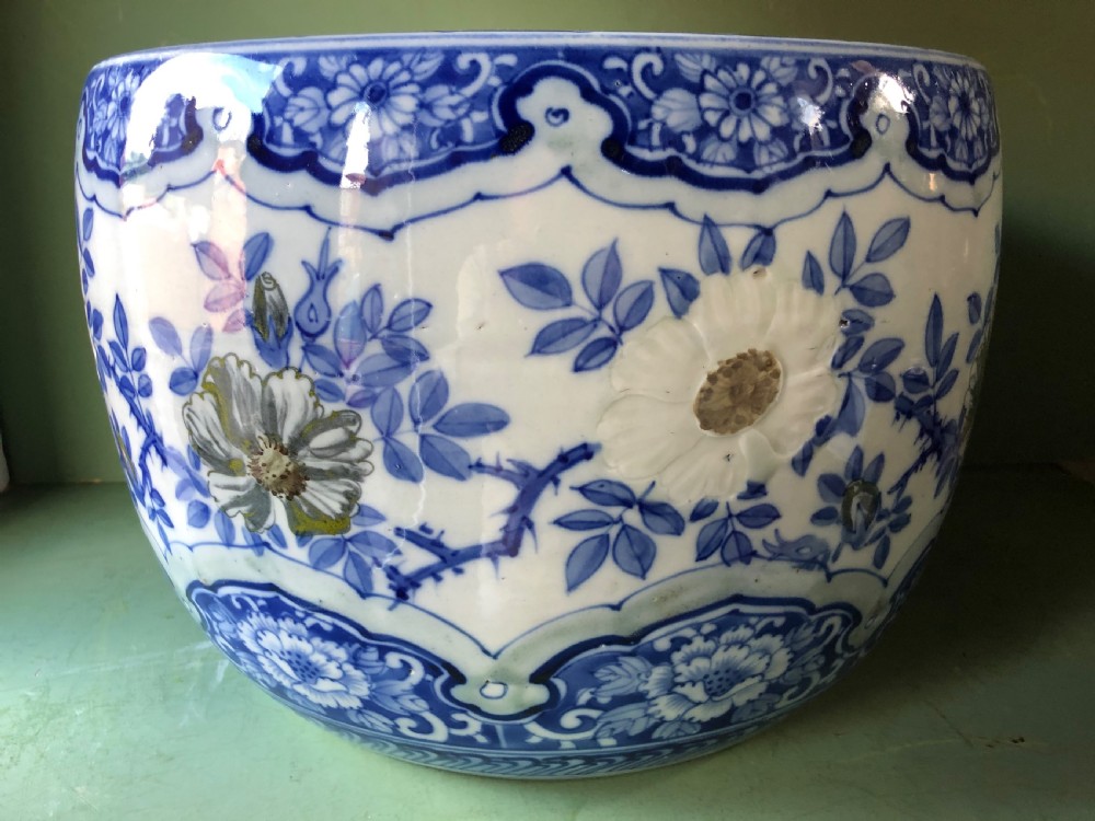 Large late C19th Japanese porcelain jardiniere or ‘fish-bowl’ with blue and white floral decoration.