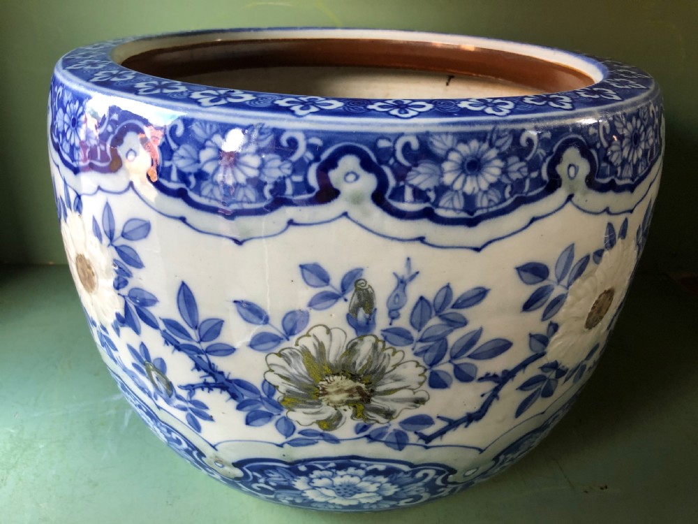 Large late C19th Japanese porcelain jardiniere or ‘fish-bowl’ with blue and white floral decoration. View II
