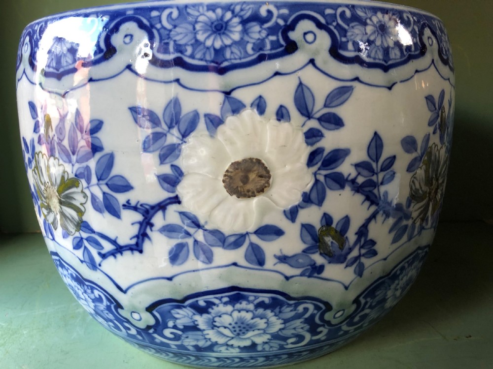 Large late C19th Japanese porcelain jardiniere or ‘fish-bowl’ with blue and white floral decoration. View III